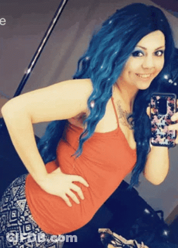 Woman With Blue Hair Taking Selfie GIF