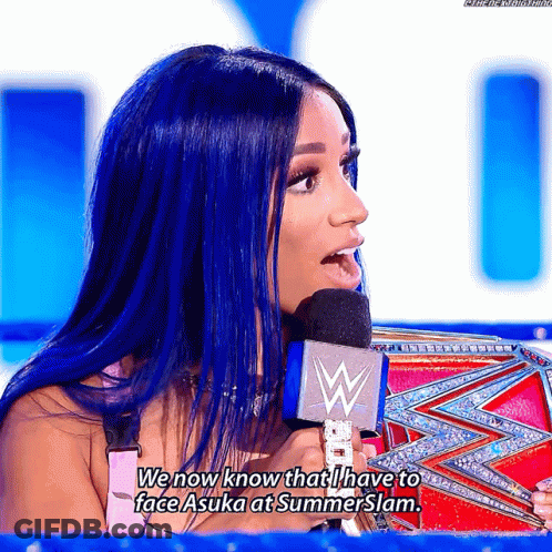 Woman With Blue Hair Talking Into Microphone Says We Now Know That I Have To Face Asuka At Summerslam GIF