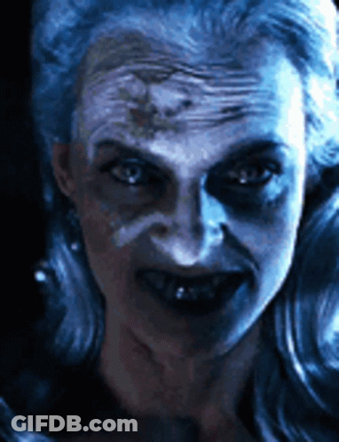 Woman With Blue Paint On Face GIF