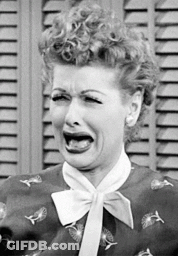Woman With Bow Tie Making Funny Face GIF