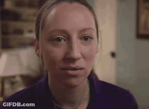 Woman With Braces Smiling In Purple Shirt GIF