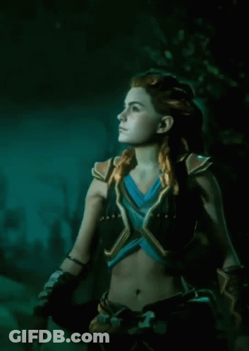 Woman With Braided Hair And Crop Top In Dark Forest GIF