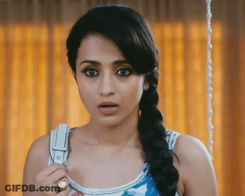 Woman With Braided Hair Holding Scissors GIF