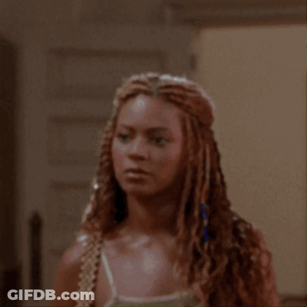 Woman With Braided Hair Looking Surprised GIF