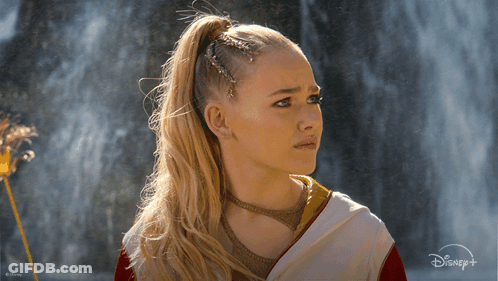 Woman With Braided Ponytail And Disney Logo GIF