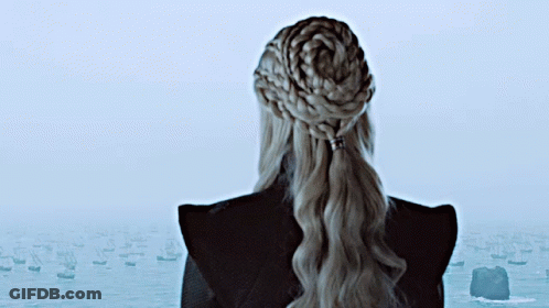 Woman With Braided Ponytail Looking Over Water GIF