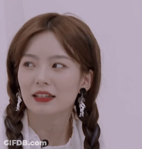 Woman With Braids And Earrings GIF