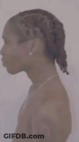 Woman With Braids And Necklace GIF