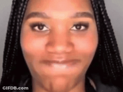 Woman With Braids Making Funny Face GIF