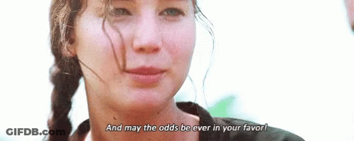 Woman With Braids Saying May The Odds Be GIF