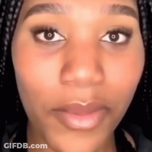 Woman With Braids Serious Look GIF