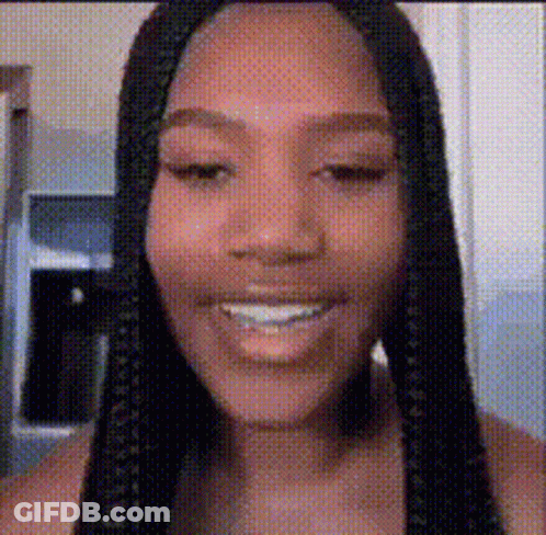 Woman With Braids Smiling GIF