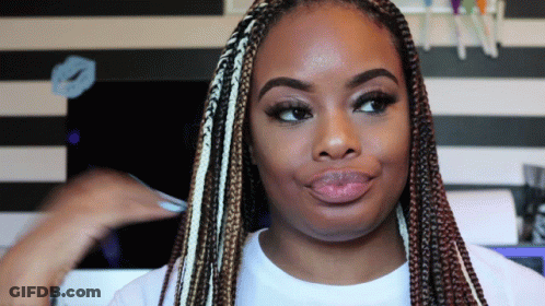Woman With Braids Smiling GIF