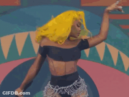 Woman With Bright Yellow Hair Dancing GIF
