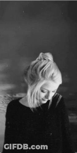 Woman With Bun In Hair GIF