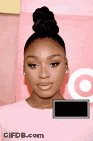 Woman With Bun Standing In Front Of Target Logo GIF