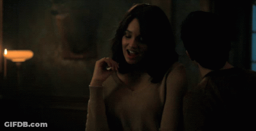 Woman With Candle In Dark Room GIF