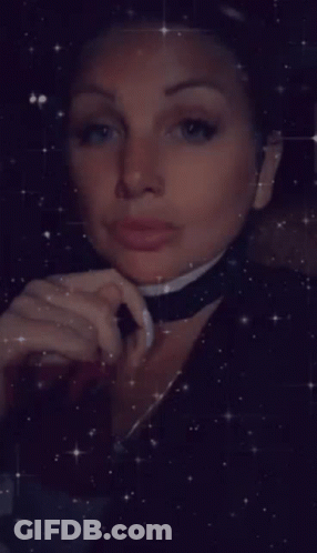 Woman With Choker Looking Down GIF