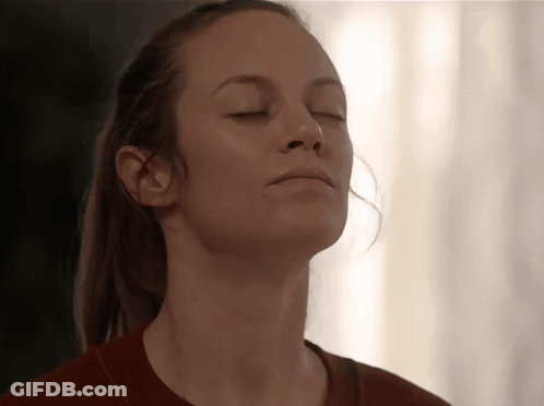 Woman With Closed Eyes And Ponytail GIF