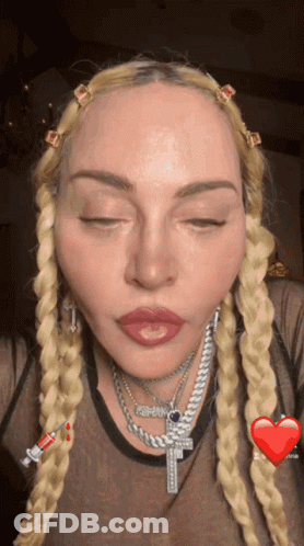 Woman With Cross Necklace GIF
