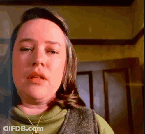 Woman With Cross Necklace GIF