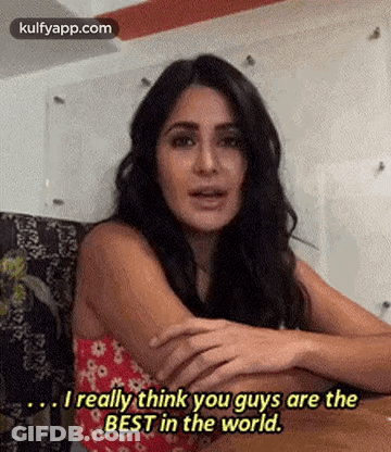 Woman With Crossed Arms Talking To Man GIF