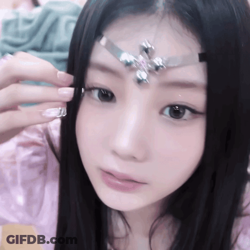 Woman With Crown On Forehead GIF