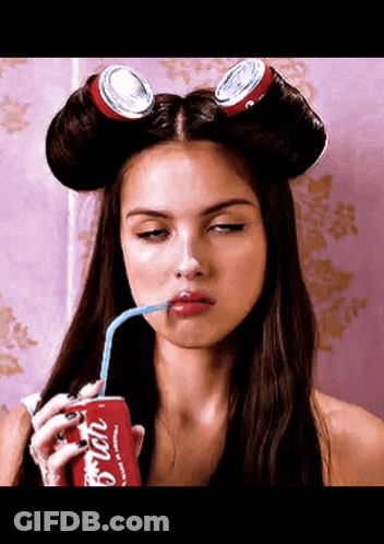 Woman With Curlers Drinking Coca Cola GIF