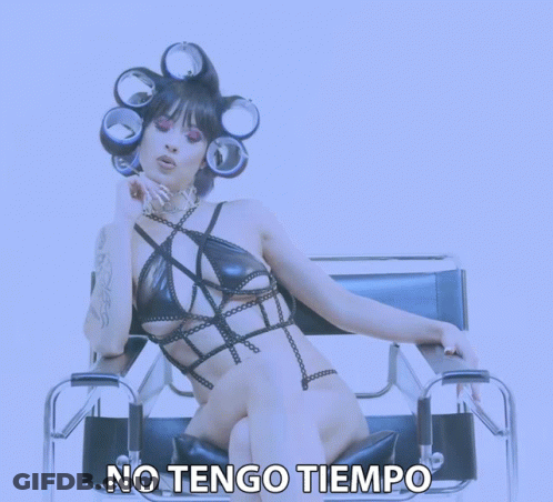 Woman With Curlers Sitting In Chair Saying No Tengo Tiempo GIF