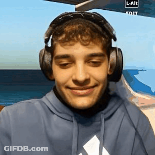 Woman With Curly Hair And Earrings GIF