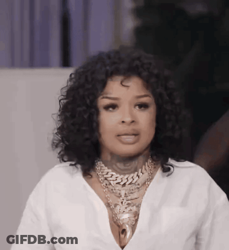 Woman With Curly Hair And Gold Chain GIF