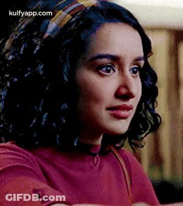 Woman With Curly Hair And Headband GIF