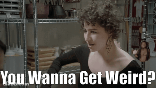 Woman With Curly Hair And Neck Tattoo Saying You Wanna Get Weird GIF