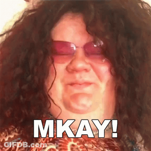 Woman With Curly Hair And Pink Sunglasses Says Mkay GIF