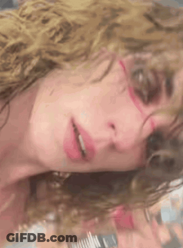 Woman With Curly Hair And Sunglasses GIF