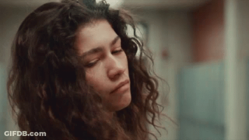 Woman With Curly Hair Close Up GIF