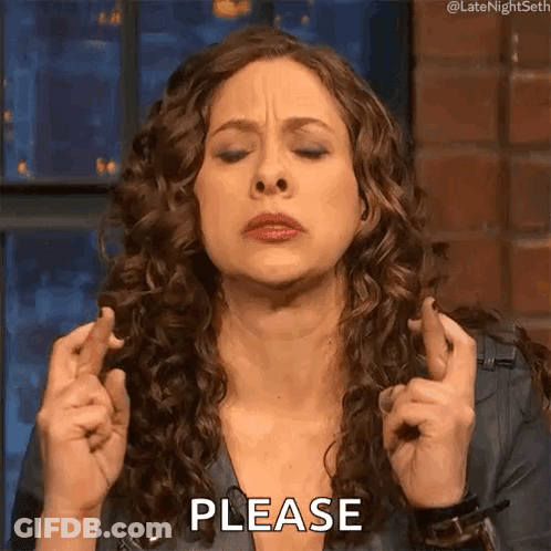 Woman With Curly Hair Crossing Fingers Making Please Sign GIF