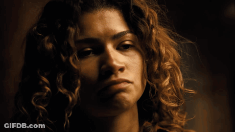 Woman With Curly Hair Funny Face GIF