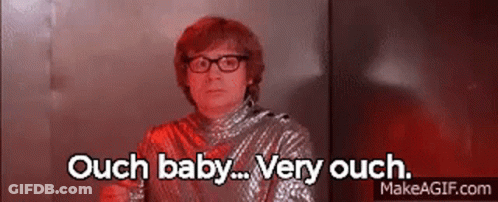 Woman With Curly Hair Glasses Hello Kitty Sweater GIF