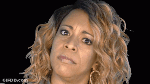 Woman With Curly Hair Hoop Earrings Funny Face GIF