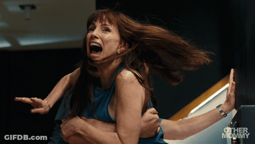 Woman With Curly Hair Saying Blocked GIF