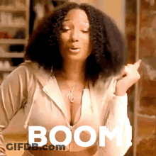 Woman With Curly Hair Saying Boom GIF
