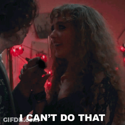 Woman With Curly Hair Says I Can't Do That Holding Man's Hand GIF
