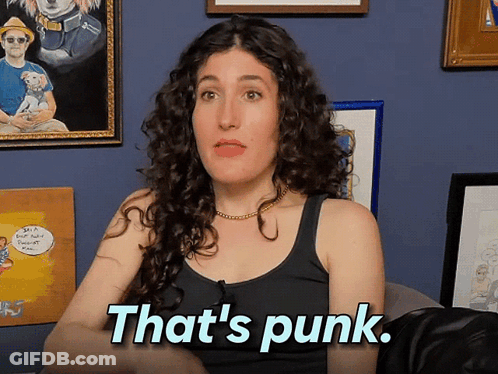 Woman With Curly Hair Says Punk GIF