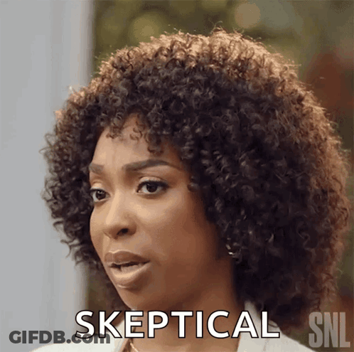 Woman With Curly Hair Skeptical Gesture GIF