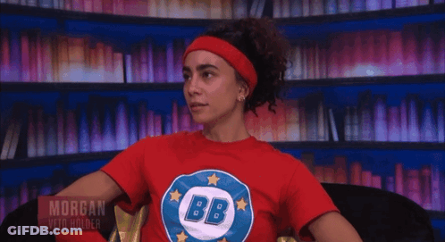 Woman With Curly Hair Sticking Tongue Out GIF