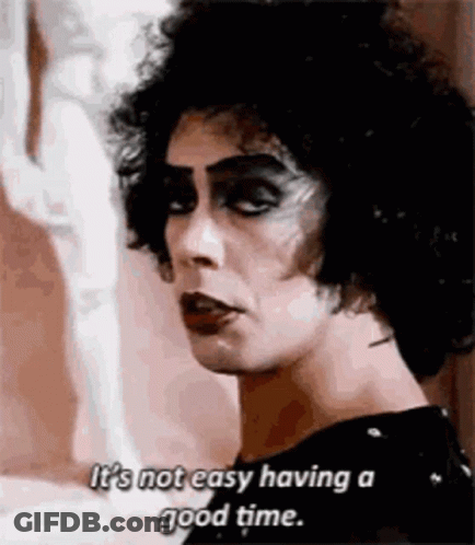 Woman With Curly Hair Talking About Having A Good Time GIF