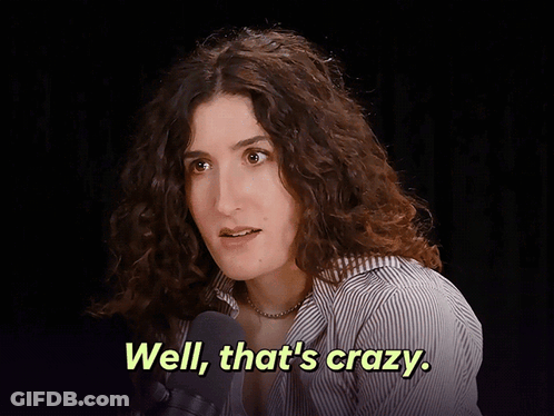 Woman With Curly Hair Talking Into Microphone Says Well That's Crazy GIF