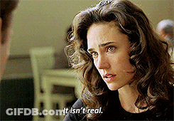 Woman With Curly Hair Talking To Man Says It Isn't Real GIF
