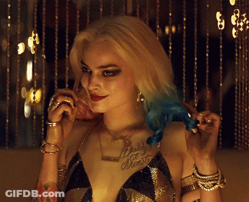 Woman With Daddy's Little Monster Chest Tattoo GIF